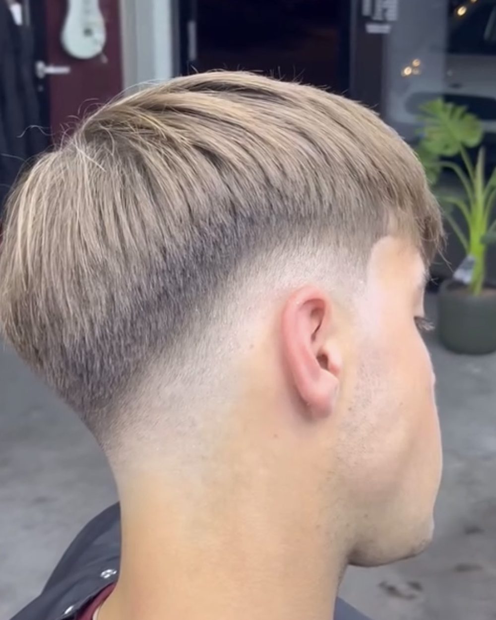 Golvend haar met midfade en wolftaper - SJDEBARBER Rotterdam Nesselande