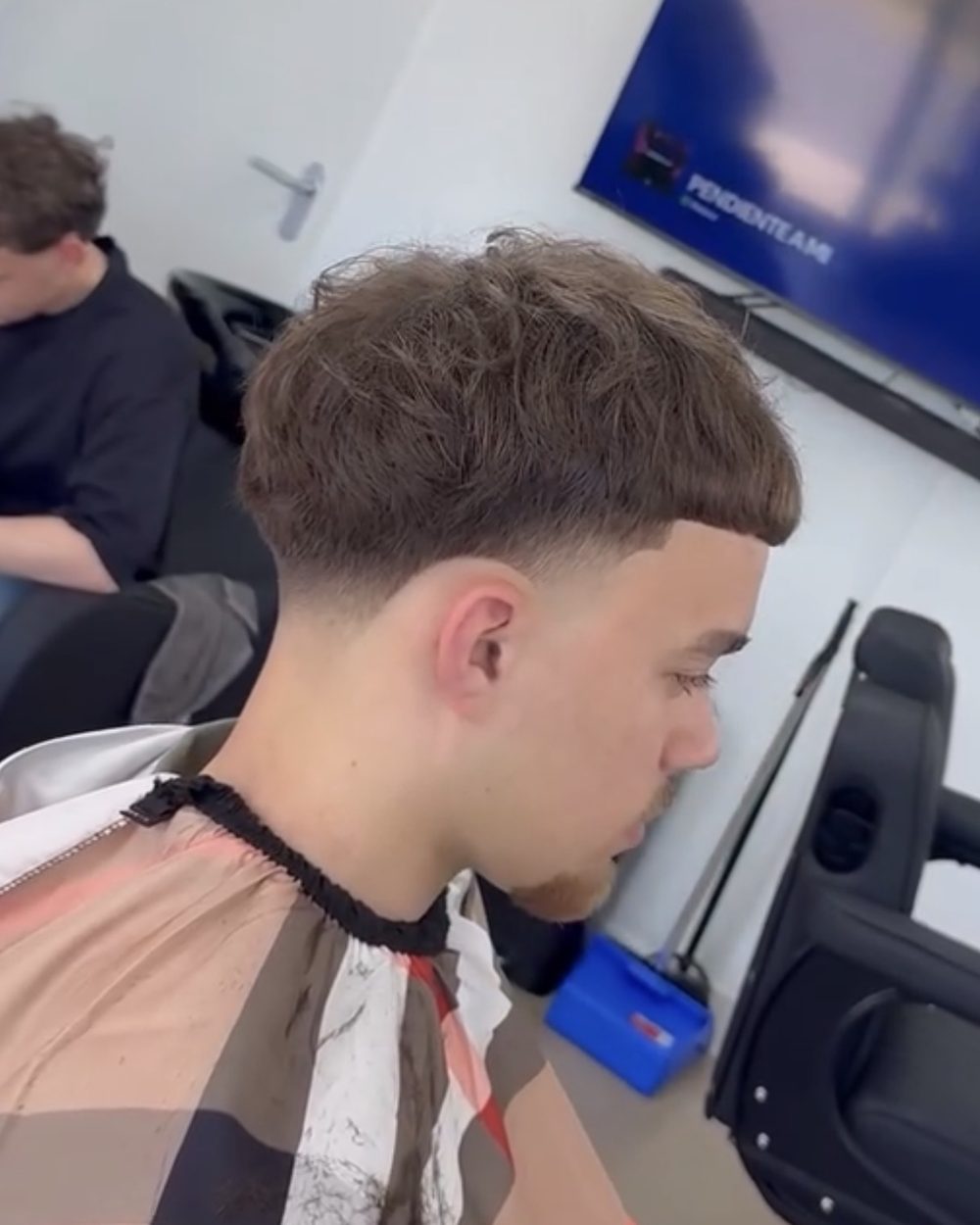 Taper fade met natuurlijke textuur - barber SJDEBARBER Nesselande